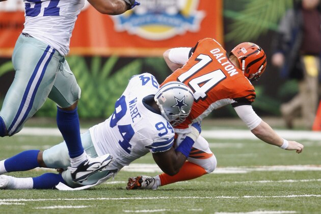 CINCINNATI, OH - DECEMBER 09:  DeMarcus Ware #94 of the Dallas Cowboys sacks Andy Dalton #14 of the Cincinnati Bengals during their game at Paul Brown Stadium on December 9, 2012 in Cincinnati, Ohio.  The Cowboys defeated the Bengals 20-19.  (Photo by John Grieshop/Getty Images)