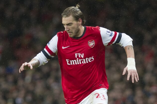 Arsenal's Nicklas Bendtner, controls the ball against Cardiff City, during their English Premier League match, at Emirates Stadium, in London, Wednesday, Jan. 1, 2014. (AP Photo/Bogdan Maran)