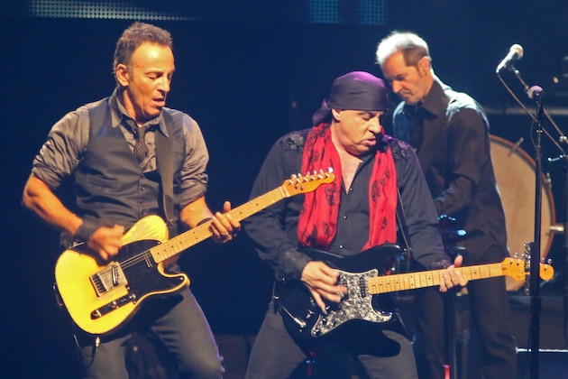 American performer Bruce Springsteen, left, plays with band member Steven Van Zandt, right, during his live performance in Cape Town, South Africa, Sunday, Jan. 26, 2014. (AP Photo/Schalk van Zuydam)