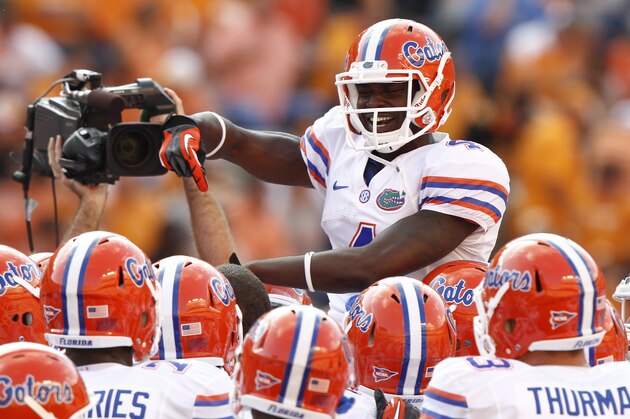 Florida Gators wide receiver Andre Debose (4) celebrates with teammates before the start of an NCAA college football game between Florida and Tennessee on Saturday, Sept. 15, 2012, in Knoxville, Tenn. (AP Photo/Wade Payne)