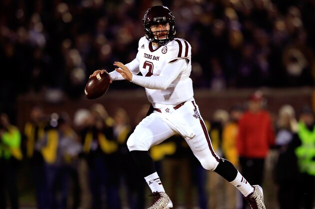 COLUMBIA, MO - NOVEMBER 30:  Quarterback Johnny Manziel #2 of the Texas A&M Aggies scrambles during the game against the Missouri Tigers on November 30, 2013 in Columbia, Missouri.  (Photo by Jamie Squire/Getty Images)
