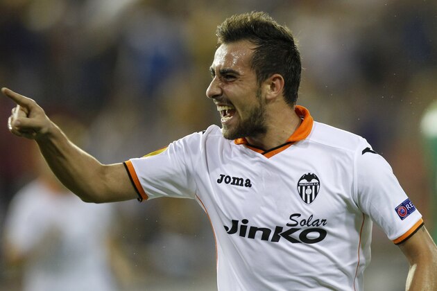 Valencia's Paco Alcacer celebrates after scoring against St Gallen during their Europa League Group A soccer match at the Mestalla stadium in Valencia, Spain, Thursday Oct. 24, 2013. (AP Photo/Alberto Saiz)