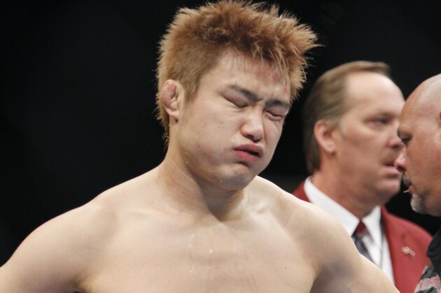 Takanori Gomi reacts after his loss to Clay Guida shortley after their UFC lightweight mixed martial arts match Saturday, Jan. 1, 2011 at The MGM Grand Garden Arena in Las Vegas. Guida won by submission. (AP Photo/Eric Jamison) Takanori Gomi reacts after his loss to Clay Guida shortley after their UFC lightweight mixed martial arts match Saturday, Jan. 1, 2011 at The MGM Grand Garden Arena in Las Vegas. Guida won by submission. (AP Photo/Eric Jamison)