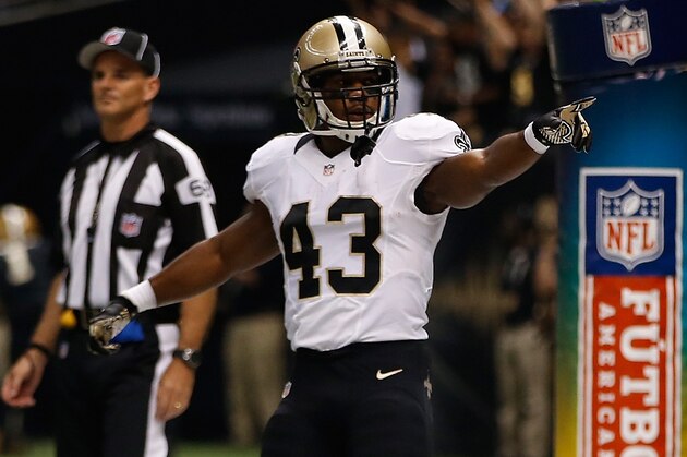 NEW ORLEANS, LA - SEPTEMBER 30:  Running back Darren Sproles #43 of the New Orleans Saints celebrates after Sproles scores on a five-yard run in the first quarter against the Miami Dolphins at the Mercedes-Benz Superdome on September 30, 2013 in New Orleans, Louisiana.  (Photo by Chris Graythen/Getty Images)