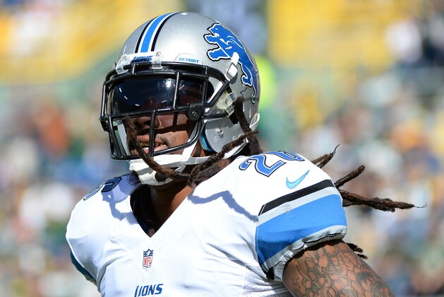 GREEN BAY, WI - OCTOBER 06:  Louis Delmas #26 of the Detroit Lions warms up before the game against the Green Bay Packers at Lambeau Field on October 6, 2013 in Green Bay, Wisconsin.  (Photo by Harry How/Getty Images)