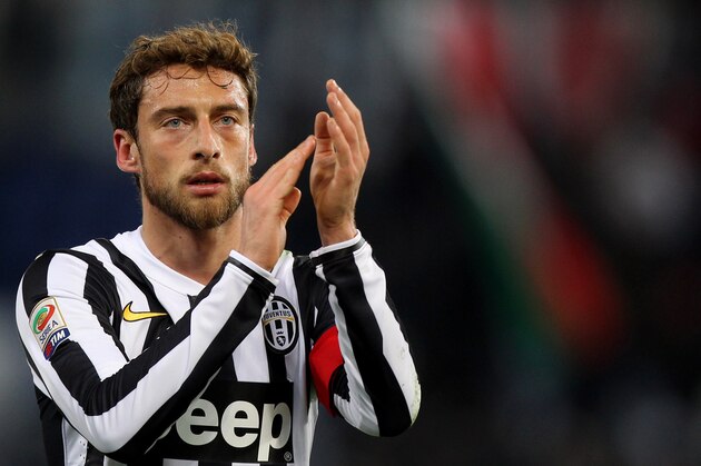 ROME, ITALY - JANUARY 25:  Claudio Marchisio of Juventus greets the fans during the Serie A match between S.S. Lazio and Juventus at Stadio Olimpico on January 25, 2014 in Rome, Italy.  (Photo by Paolo Bruno/Getty Images)