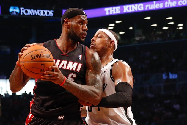 Oct 17, 2013; Brooklyn, NY, USA; Brooklyn Nets small forward Paul Pierce (34) holds off Miami Heat small forward LeBron James (6) during the first quarter at Barclays Center. Mandatory Credit: Anthony Gruppuso-USA TODAY Sports Oct 17, 2013; Brooklyn, NY, USA; Brooklyn Nets small forward Paul Pierce (34) holds off Miami Heat small forward LeBron James (6) during the first quarter at Barclays Center. Mandatory Credit: Anthony Gruppuso-USA TODAY Sports