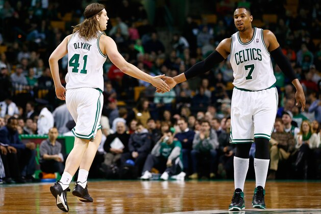 BOSTON, MA - DECEMBER 16: Kelly Olynyk #41 and Jared Sullinger #7 of the Boston Celtics react following a basket in the second quarter against the Minnesota Timberwolves during the game at TD Garden on December 16, 2013 in Boston, Massachusetts. NOTE TO USER: User expressly acknowledges and agrees that, by downloading and or using this photograph, User is consenting to the terms and conditions of the Getty Images License Agreement.  (Photo by Jared Wickerham/Getty Images)