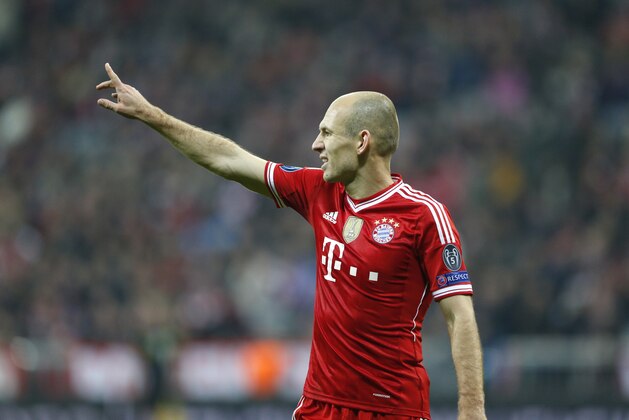 Bayern's Arjen Robben gestures during the Champions League round of 16 second leg soccer match between FC Bayern Munich and FC Arsenal in Munich, Germany, Wednesday, March 12, 2014. (AP Photo/Matthias Schrader)