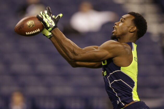 Oregon State wide receiver Brandin Cooks makes a catch during a drill at the NFL football scouting combine in Indianapolis, Sunday, Feb. 23, 2014. (AP Photo/Michael Conroy) Oregon State wide receiver Brandin Cooks makes a catch during a drill at the NFL football scouting combine in Indianapolis, Sunday, Feb. 23, 2014. (AP Photo/Michael Conroy)