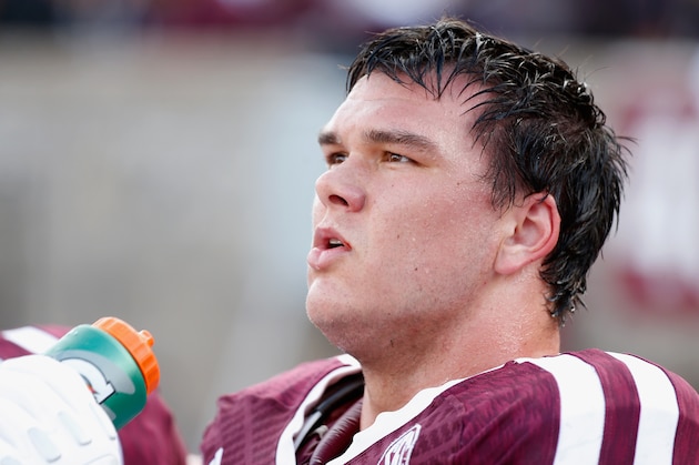 COLLEGE STATION, TX - NOVEMBER 09:  Jake Matthews #75 of the Texas A&M Aggies waits on the bench during the game against the Mississippi State Bulldogs at Kyle Field on November 9, 2013 in College Station, Texas.  (Photo by Scott Halleran/Getty Images)