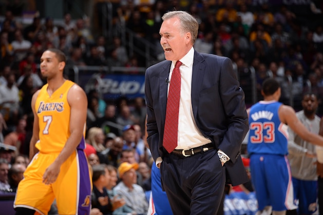 LOS ANGELES, CA - MARCH 6: Head coach Mike D'Antoni of the Los Angeles Lakers reacts during a game against the Los Angeles Clippers at Staples Center on March 6, 2014 in Los Angeles, California. NOTE TO USER: User expressly acknowledges and agrees that, by downloading and/or using this Photograph, user is consenting to the terms and conditions of the Getty Images License Agreement. Mandatory Copyright Notice: Copyright 2014 NBAE (Photo by Andrew D. Bernstein/NBAE via Getty Images)