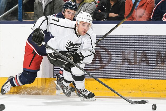COLUMBUS, OH - JANUARY 21:  Alec Martinez #27 of the Los Angeles Kings skates with the puck against the Columbus Blue Jackets on January 21, 2014 at Nationwide Arena in Columbus, Ohio. Columbus defeated Los Angeles 5-3, extending their win streak to seven games. (Photo by Jamie Sabau/NHLI via Getty Images)