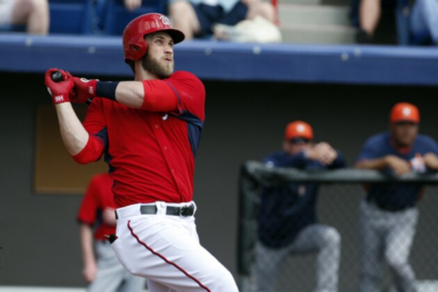 Washington Nationals left fielder Bryce Harper watches his home run during a spring exhibition baseball game against the Houston Astros, Friday, March 7, 2014, in Viera, Fla. (AP Photo/Alex Brandon)