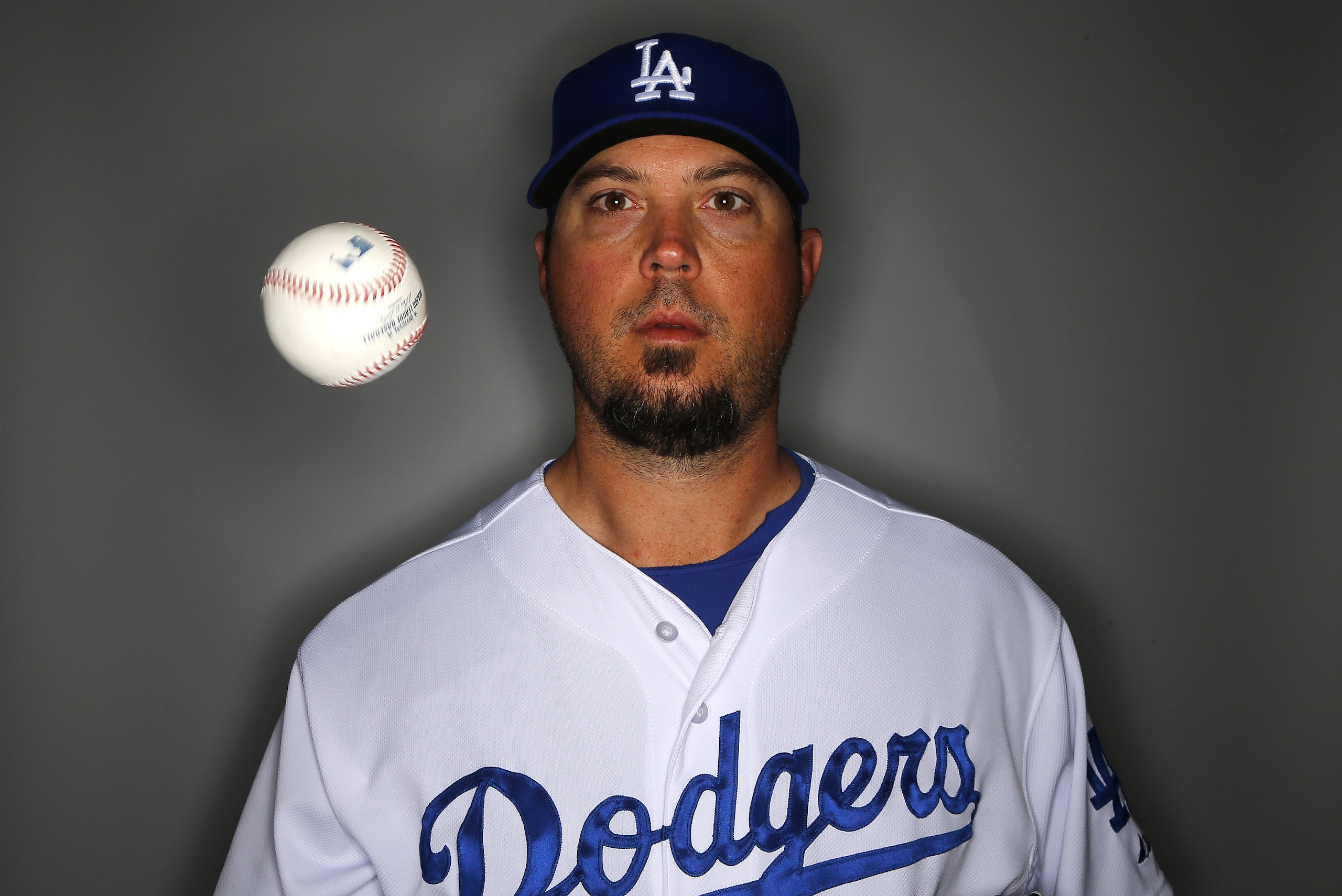 Los Angeles Dodgers pitcher Josh Beckett poses for a photograph on photo day Feb. 20, 2014 in Glendale, Ariz. (AP Photo/Paul Sancya)