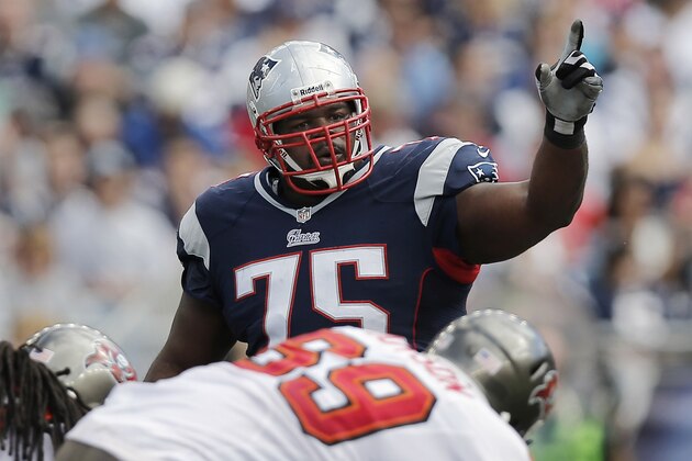 FOXBORO, MA - SEPTEMBER 22:  Vince Wilfork #75 of the New England Patriots signals to the defense during the second half of their 23-3 win over the Tampa Bay Buccaneers at Gillette Stadium on September 22, 2013 in Foxboro, Massachusetts.  (Photo by Winslow Townson/Getty Images)