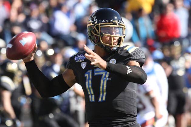 UCLA quarterback Brett Hundley throws a pass against Virginia Tech during the Sun Bowl NCAA college football game Tuesday Dec. 31, 2013. (AP Photo/Victor Calzada)