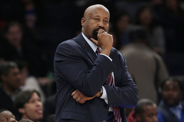 New York Knicks' Mike Woodson reacts during the second half of an NBA basketball game against the Golden State Warriors, Friday, Feb. 28, 2014, in New York. The Warriors won the game 126-103. (AP Photo/Frank Franklin II)