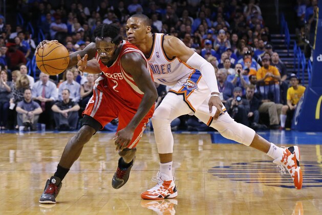 Houston Rockets guard Pat Beverley (2) drives around Oklahoma City Thunder guard Russell Westbrook (0) during the first quarter of an NBA basketball game in Oklahoma City, Tuesday, March 11, 2014. (AP Photo/Sue Ogrocki) Houston Rockets guard Pat Beverley (2) drives around Oklahoma City Thunder guard Russell Westbrook (0) during the first quarter of an NBA basketball game in Oklahoma City, Tuesday, March 11, 2014. (AP Photo/Sue Ogrocki)