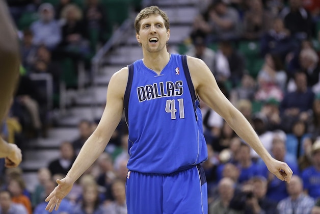 Dallas Mavericks' Dirk Nowitzki (41) looks on after scoring against the Utah Jazz in the second quarter during an NBA basketball game Wednesday, March 12, 2014, in Salt Lake City. (AP Photo/Rick Bowmer)