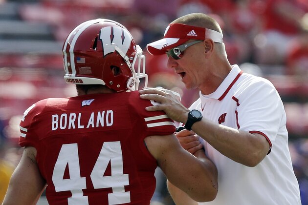 Wisconsin head coach Gary Andersen with Chris Borland (44) before an NCAA college football game against Tennessee Tech Saturday, Sept. 7, 2013, in Madison, Wis. (AP Photo/Morry Gash)