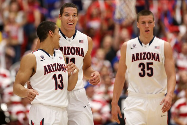TUCSON, AZ - FEBRUARY 26:  (L-R) Nick Johnson #13, Aaron Gordon #11 and Kaleb Tarczewski #35 of the Arizona Wildcats react after scoring against the California Golden Bears during the second half of the college basketball game at McKale Center on February 26, 2014 in Tucson, Arizona. The Wildcats defeated the Golden Bears 87-59.  (Photo by Christian Petersen/Getty Images)