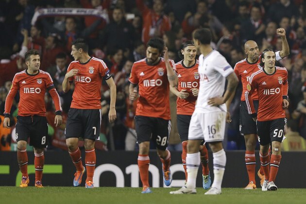 Benfica's players celebrate the goal of Luisao, second right, during the Europa League round of 16 first leg soccer match between Tottenham Hotspur and SL Benfica at White Hart Lane stadium in London Thursday, March 13, 2014. (AP Photo/Kirsty Wigglesworth)