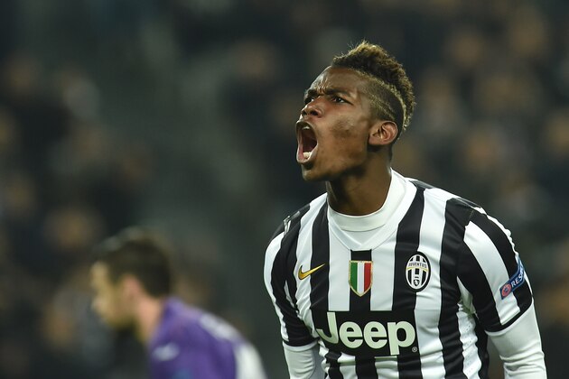 TURIN, ITALY - MARCH 13:  Paul Pogba of Juventus reacts during the UEFA Europa League Round of 16 match between Juventus and ACF Fiorentina at Juventus Arena on March 13, 2014 in Turin, Italy.  (Photo by Valerio Pennicino/Getty Images)