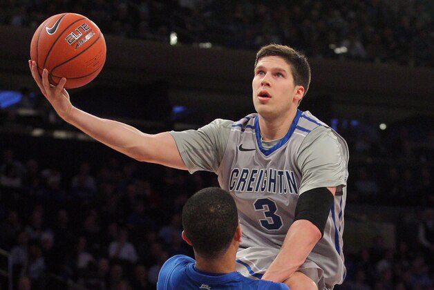 Mar 13, 2014; New York, NY, USA; Creighton Bluejays forward Doug McDermott (3) drives on DePaul Blue Demons guard Billy Garrett Jr. (5) during the first half of a game in the second round of the Big East college basketball tournament at Madison Square Garden. Mandatory Credit: Brad Penner-USA TODAY Sports Mar 13, 2014; New York, NY, USA; Creighton Bluejays forward Doug McDermott (3) drives on DePaul Blue Demons guard Billy Garrett Jr. (5) during the first half of a game in the second round of the Big East college basketball tournament at Madison Square Garden. Mandatory Credit: Brad Penner-USA TODAY Sports