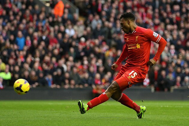LIVERPOOL, ENGLAND - FEBRUARY 23:  Daniel Sturridge of Liverpool scores the first goal during the Barclays Premier League match between Liverpool and Swansea City at Anfield on February 23, 2014 in Liverpool, England.  (Photo by Clive Brunskill/Getty Images)