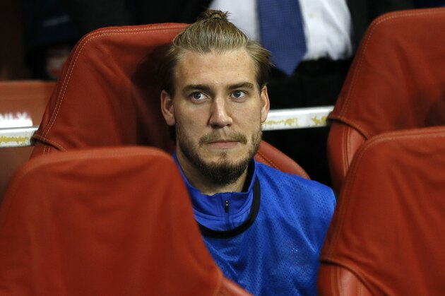 Arsenal's Nicklas Bendtner, right, sits on the bench ahead of the Champions League Group F soccer match between Arsenal and Borussia Dortmund at the Emirates Stadium in London Tuesday, Oct. 22, 2013. (AP Photo/Kirsty Wigglesworth) Arsenal's Nicklas Bendtner, right, sits on the bench ahead of the Champions League Group F soccer match between Arsenal and Borussia Dortmund at the Emirates Stadium in London Tuesday, Oct. 22, 2013. (AP Photo/Kirsty Wigglesworth)