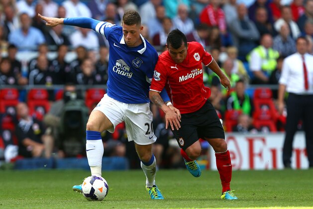 CARDIFF, WALES - AUGUST 31:   Ross Barkley of Everton controls the ball from Gary Medal of Cardiff City during the Barclays Premier League match between Cardiff City and Everton at Cardiff City Stadium on August 31, 2013 in Cardiff, Wales.  (Photo by Jan Kruger/Getty Images)