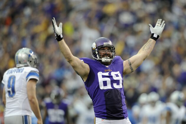 MINNEAPOLIS, MN - DECEMBER 29: Jared Allen #69 of the Minnesota Vikings celebrates a sack as Matthew Stafford #9 of the Detroit Lions looks on during the first quarter of the game on December 29, 2013 at Mall of America Field at the Hubert H. Humphrey Metrodome in Minneapolis, Minnesota. (Photo by Hannah Foslien/Getty Images)