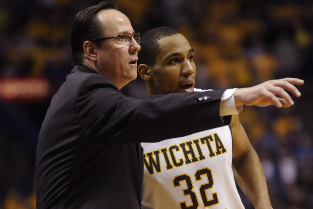 Wichita State coach Gregg Marshall directs Tekele Cotton (32) against Indiana State in the second half of an NCAA college basketball game in the championship of the Missouri Valley Conference men's tournament, Sunday, March 9, 2014, in St. Louis. (AP Photo/Bill Boyce) Wichita State coach Gregg Marshall directs Tekele Cotton (32) against Indiana State in the second half of an NCAA college basketball game in the championship of the Missouri Valley Conference men's tournament, Sunday, March 9, 2014, in St. Louis. (AP Photo/Bill Boyce)
