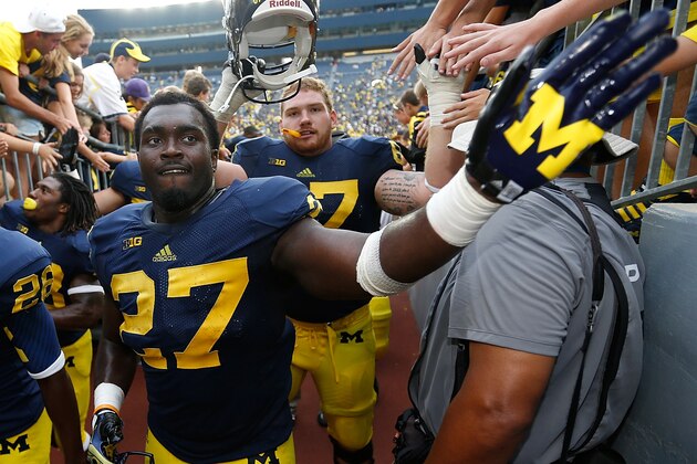 ANN ARBOR, MI - AUGUST 31: Jourdan Lewis #26 and Derrick Green #27 of the Michigan Wolverines leave the field after a 59-9 win over the Central Michigan Chippewas at Michigan Stadium on August 31, 2013 in Ann Arbor, Michigan. (Photo by Gregory Shamus/Getty Images) ANN ARBOR, MI - AUGUST 31: Jourdan Lewis #26 and Derrick Green #27 of the Michigan Wolverines leave the field after a 59-9 win over the Central Michigan Chippewas at Michigan Stadium on August 31, 2013 in Ann Arbor, Michigan. (Photo by Gregory Shamus/Getty Images)