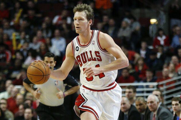 Chicago Bulls small forward Mike Dunleavy (34) advances against the San Antonio Spurs during the second half of an NBA basketball game on Tuesday, March 11, 2014, in Chicago. The San Antonio Spurs defeated The Chicago Bulls 104-96. (AP Photo/Andrew A. Nelles)