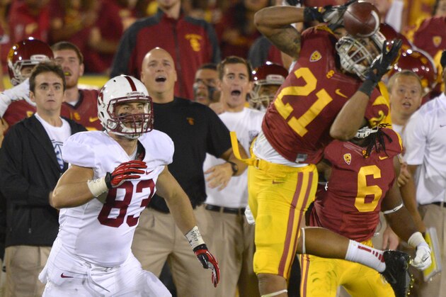 Southern California safety Su'a Cravens, right, intercepts a pass as Stanford tight end Davis Dudchock looks on during the second half of an NCAA college football game, Saturday, Nov. 16, 2013, in Los Angeles. USC won 20-17. (AP Photo/Mark J. Terrill)