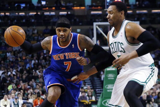 New York Knicks forward Carmelo Anthony, left, drives against Boston Celtics center Jared Sullinger, right, during the first quarter of an NBA basketball game in Boston, Wednesday, March 12, 2014. (AP Photo/Elise Amendola) New York Knicks forward Carmelo Anthony, left, drives against Boston Celtics center Jared Sullinger, right, during the first quarter of an NBA basketball game in Boston, Wednesday, March 12, 2014. (AP Photo/Elise Amendola)