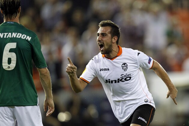 Valencia's Paco Alcacer celebrates after scoring against St Gallen during their Europa League Group A soccer match at the Mestalla stadium in Valencia, Spain, Thursday, Oct. 24, 2013. (AP Photo/Alberto Saiz)