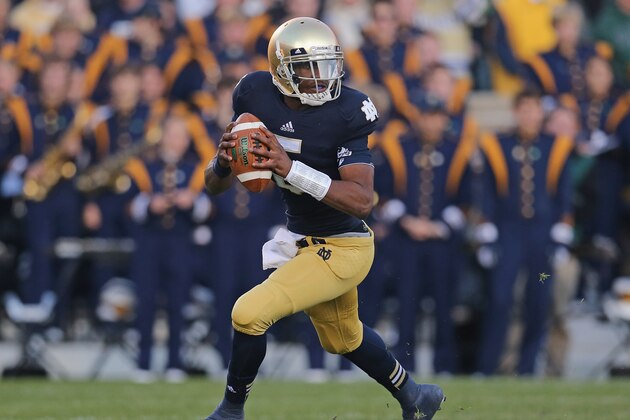 SOUTH BEND, IN - NOVEMBER 17:  Everett Golson #5 of the Notre Dame Fighting Irish rolls out against the Wake Forest Demon Deacons at Notre Dame Stadium on November 17, 2012 in South Bend, Indiana. Notre Dame defeated Wake Forest 38-0.  (Photo by Jonathan Daniel/Getty Images)