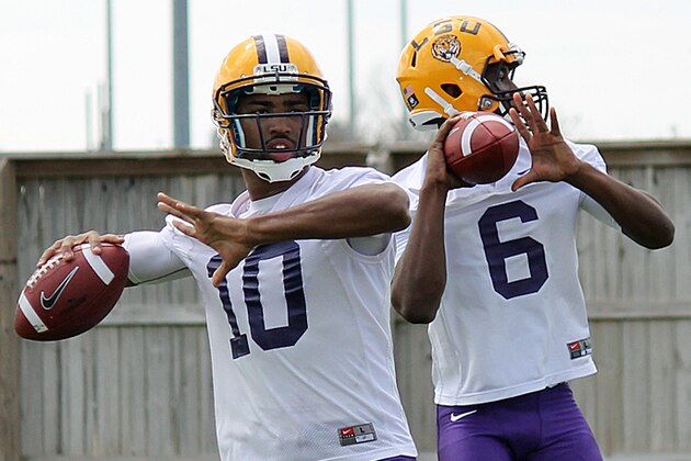 Anthony Jennings (left) throws with Brandon Harris (right) during LSU's first week of spring practice.