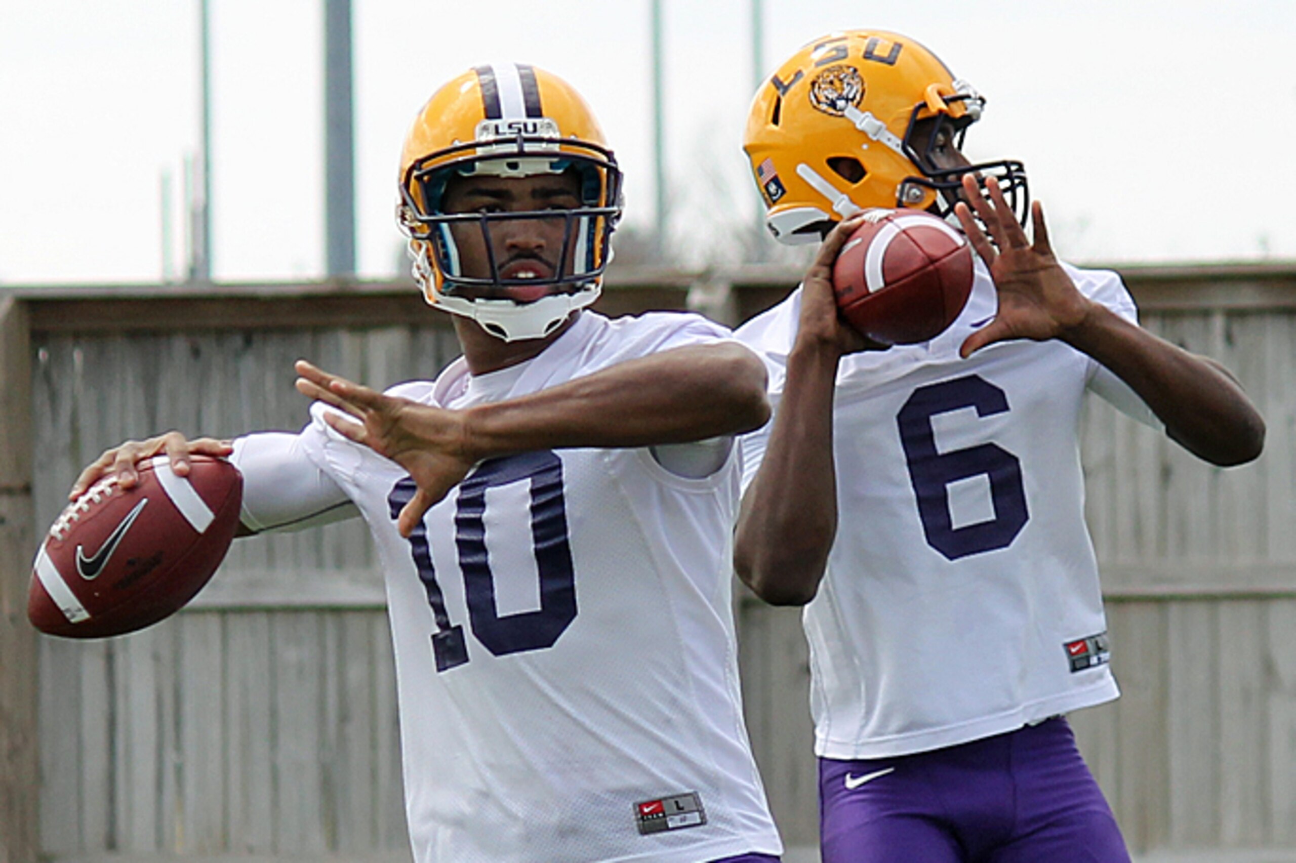 Anthony Jennings (left) throws with Brandon Harris (right) during LSU's first week of spring practice.