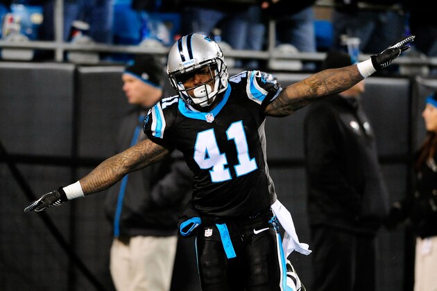 CHARLOTTE, NC - DECEMBER 15:  Captain Munnerlyn #41 of the Carolina Panthers celebrates after returning an interception for a touchdown against the New York Jets during play at Bank of America Stadium on December 15, 2013 in Charlotte, North Carolina. The Panthers won 30-20.  (Photo by Grant Halverson/Getty Images)