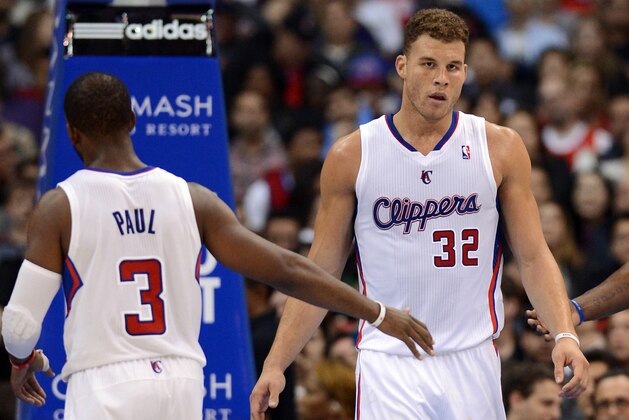 Jan 1, 2014; Los Angeles, CA, USA; Los Angeles Clippers point guard Chris Paul (3) and Los Angeles Clippers power forward Blake Griffin (32) in the second half of the game against the Charlotte Bobcats at Staples Center. Clippers won 112-85.  Mandatory Credit: Jayne Kamin-Oncea-USA TODAY Sports
