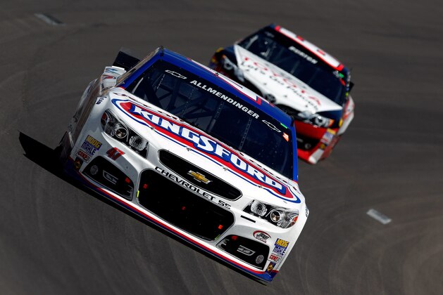 LAS VEGAS, NV - MARCH 09: AJ Allmendinger, driver of the #47 Kingsford Charcoal Chevrolet, leads Jeff Burton, driver of the #66 Let's Go Places Toyota, during the NASCAR Sprint Cup Series Kobalt 400 at Las Vegas Motor Speedway on March 9, 2014 in Las Vegas, Nevada. (Photo by Brian Lawdermilk/Getty Images) LAS VEGAS, NV - MARCH 09: AJ Allmendinger, driver of the #47 Kingsford Charcoal Chevrolet, leads Jeff Burton, driver of the #66 Let's Go Places Toyota, during the NASCAR Sprint Cup Series Kobalt 400 at Las Vegas Motor Speedway on March 9, 2014 in Las Vegas, Nevada. (Photo by Brian Lawdermilk/Getty Images)