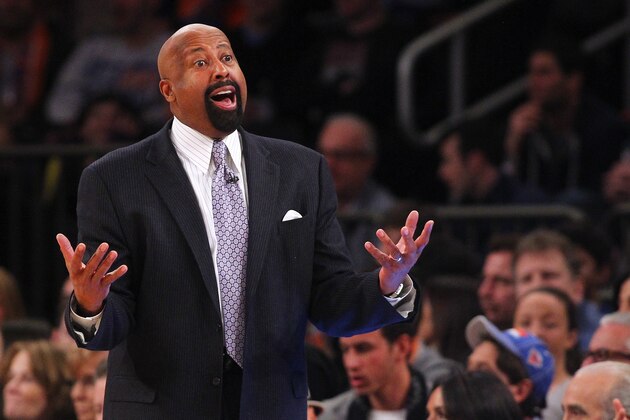 NEW YORK, NY - FEBRUARY 1: Head coach Mike Woodson  of the New York Knicks yells to a ref during the second half of a game against the Miami Heat at Madison Square Garden on February. 1, 2014 in New York City. The Heat defeated the Knicks 106-91. NOTE TO USER: User expressly acknowledges and agrees that, by downloading and/or using this Photograph, user is consenting to the terms and conditions of the Getty Images License Agreement. (Photo by Rich Schultz /Getty Images)