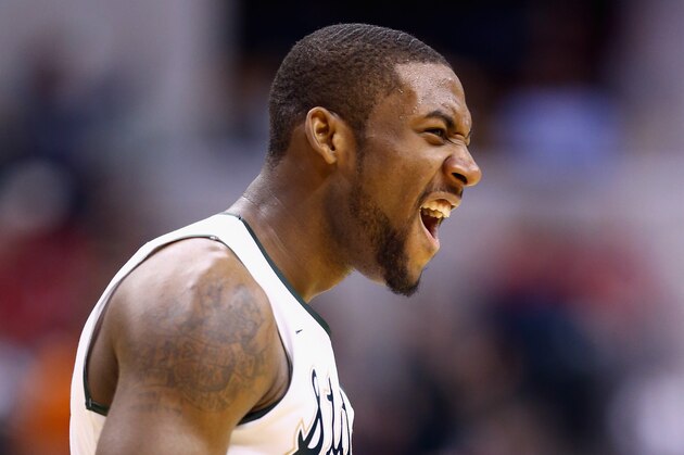 INDIANAPOLIS, IN - MARCH 14: Branden Dawson #22 of the Michigan State Spartans celebrates in the game against the Northwestern Wildcats during the Quarterfinals of the Big Ten Basketball Tournament at Bankers Life Fieldhouse on March 14, 2014 in Indianapolis, Indiana.  (Photo by Andy Lyons/Getty Images)