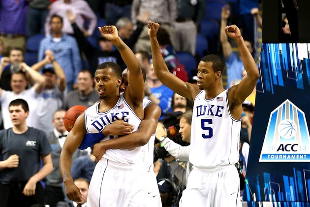 GREENSBORO, NC - MARCH 14:  Teammates Tyler Thornton #3, Rasheed Sulaimon #14 and Rodney Hood #5 of the Duke Blue Devils celebrate after defeating the Clemson Tigers 63-62 during the quarterfinals of the 2014 Men's ACC Basketball Tournament at Greensboro Coliseum on March 14, 2014 in Greensboro, North Carolina.  (Photo by Streeter Lecka/Getty Images)