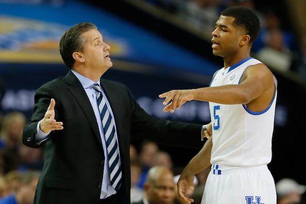 ATLANTA, GA - MARCH 14:  Head coach John Calipari of the Kentucky Wildcats converses with Andrew Harrison #5 against the LSU Tigers during the quarterfinals of the SEC Men's Basketball Tournament at Georgia Dome on March 14, 2014 in Atlanta, Georgia.  (Photo by Kevin C. Cox/Getty Images)
