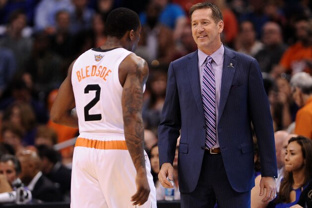 Mar 12, 2014; Phoenix, AZ, USA; Phoenix Suns head coach Jeff Hornacek  talks with guard Eric Bledsoe (2) in the first half against the Cleveland Cavaliers at US Airways Center. Mandatory Credit: Jennifer Stewart-USA TODAY Sports